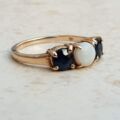 Opal and Sapphire Trilogy Ring in 9ct Gold, a UK J 1/2 or a US 5 1/4.