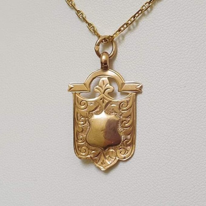 Shield Medallion in 9ct Gold.