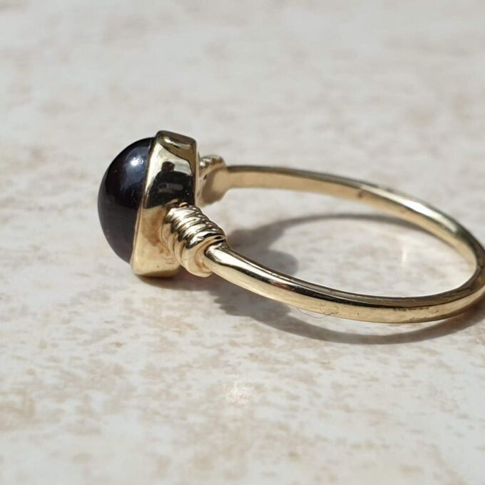 Garnet Cabochon Solitaire Ring in 9ct Gold, a UK H 1/2 or a US 4 1/4