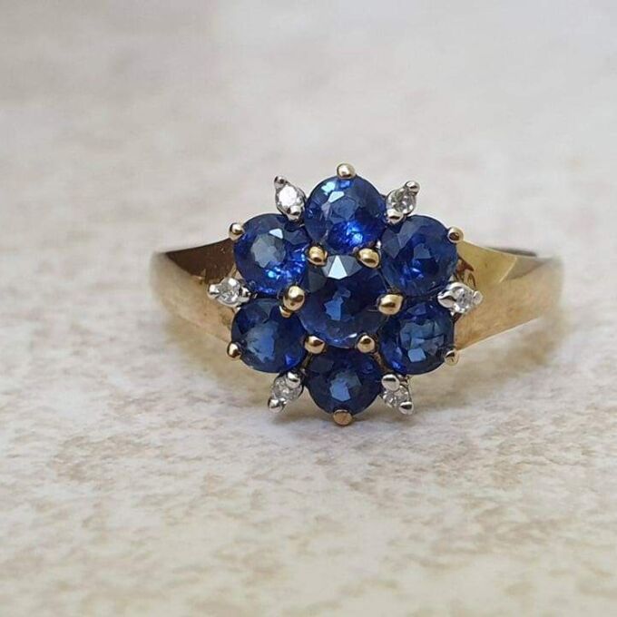 Tanzanite And Diamond Cluster Ring in 9ct Gold,  a UK J 1/2 or a US 5 1/4.