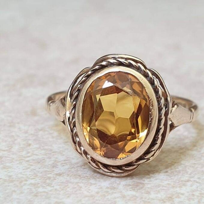 Vibrant Synthetic Yellow Sapphire in 9ct Gold, a UK N or a US 7