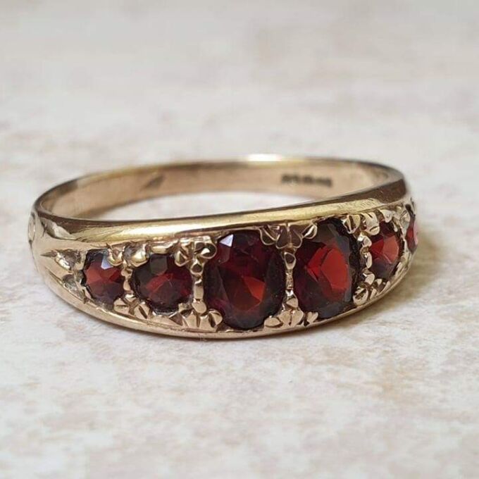 Six Stone Graduating Garnet Band Ring in 9ct Gold, a UK S or a US 9 1/4
