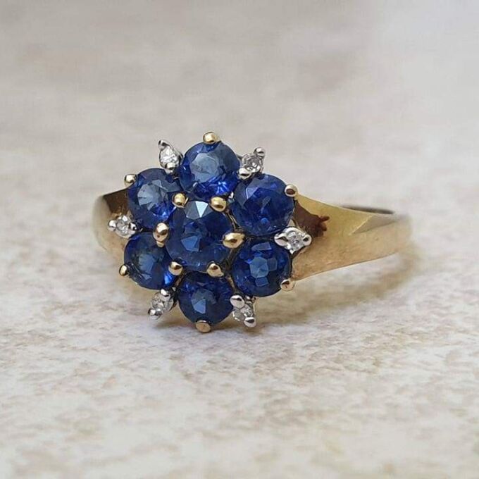 Tanzanite And Diamond Cluster Ring in 9ct Gold,  a UK J 1/2 or a US 5 1/4.
