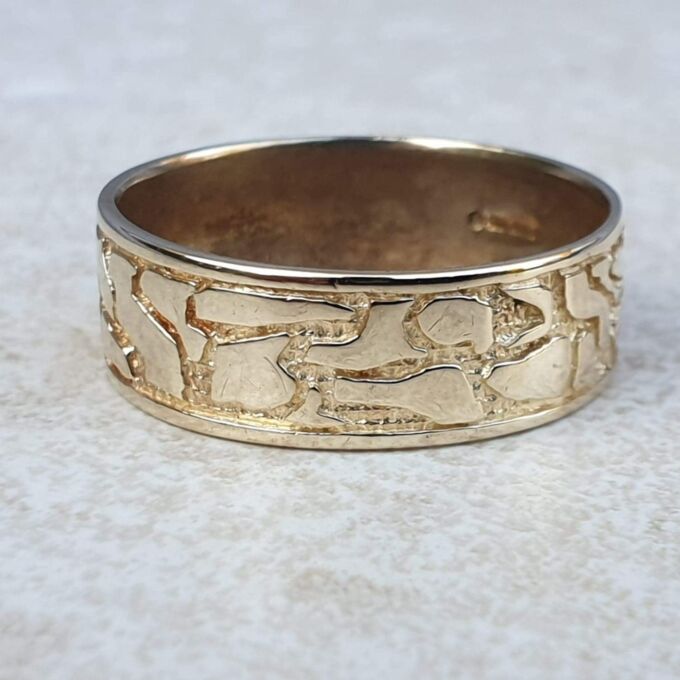 Broad Abstract Patterned Band in 9ct Gold,  a UK T or a US 10.