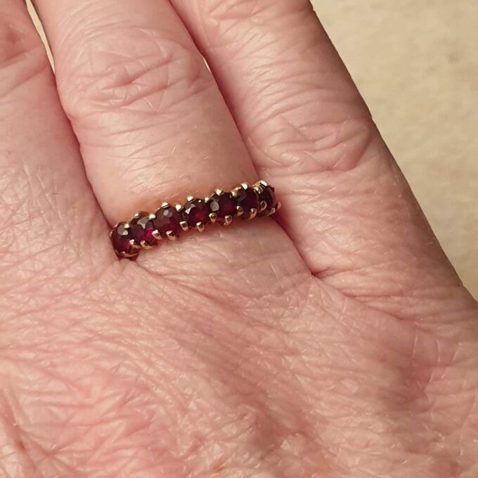 Seven Stone Garnet Band in 9ct Gold, a UK L 1/2 or a US 6
