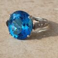 Swiss Blue Topaz Solitaire Ring in 9ct White Gold,  a UK N 1/2 or a US 7 1/4.