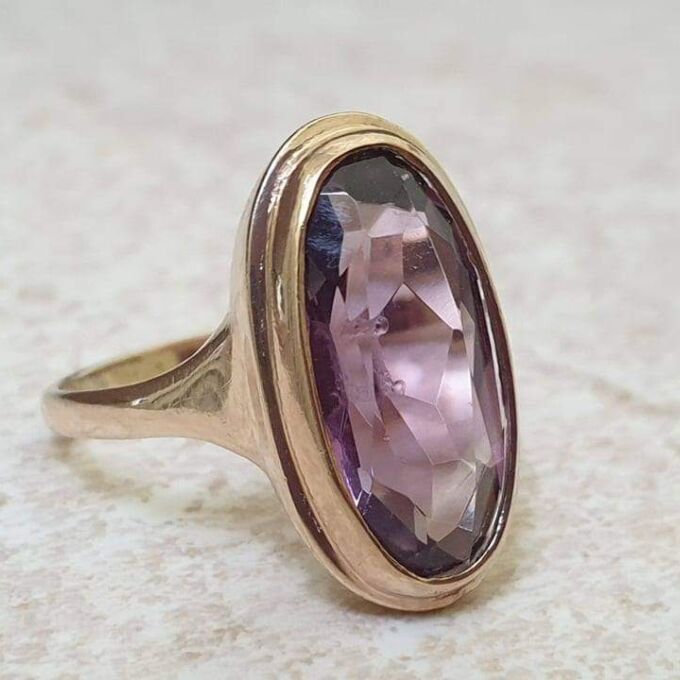 Elongated Oval Amethyst Solitaire Ring in 9ct gold.