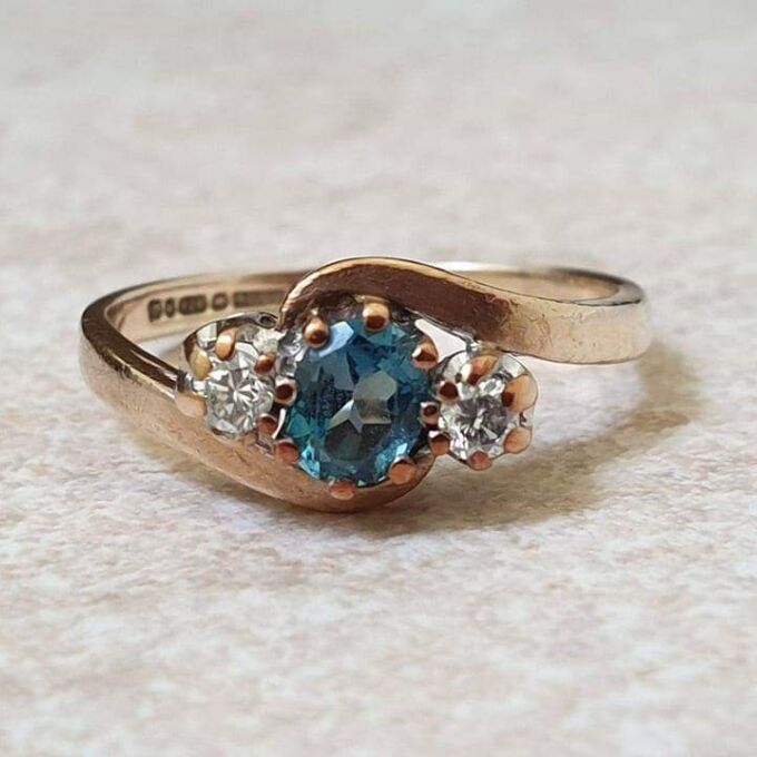 Topaz & Diamond Crossover Trilogy Ring in 9ct Gold.