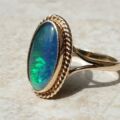 Oval Opal Doublet Ring in 9ct gold, a UK O or a US 7 1/2