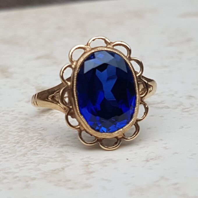 Synthetic Sapphire Solitaire Ring in 9ct Gold, a UK K or a US 5 3/4.