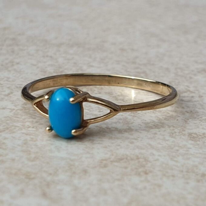 Turquoise Coloured Cabochon in 9ct Gold,  a UK O or a US 7 1/2.
