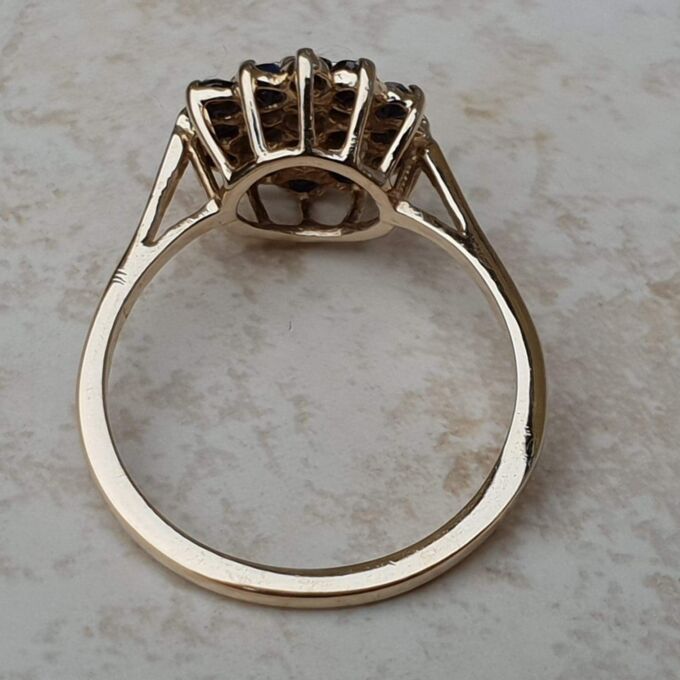 Synthetic Sapphire Cluster Ring in 9ct Gold, a UK M 1/2 or a US 6 3/4.