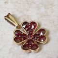 Garnet Four Leaf Clover Pendant in 9ct Gold