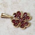 Garnet Four Leaf Clover Pendant in 9ct Gold