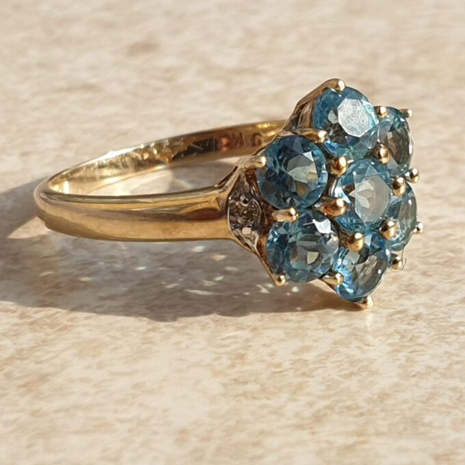 Topaz Flower Cluster Ring in 9ct Gold,  a UK O 1/2 or a US 7 3/4.