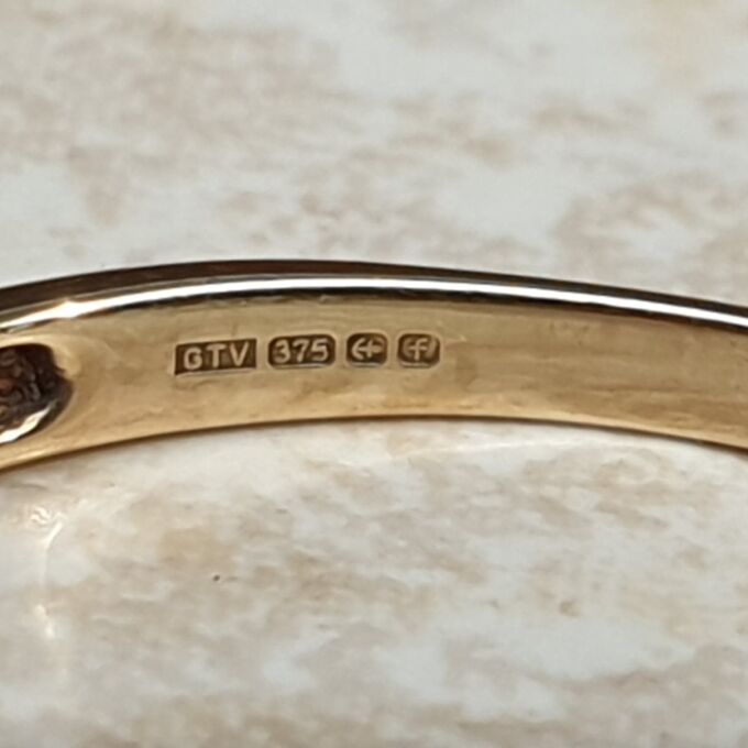 Five Stone Ruby Ring in 9ct Gold.