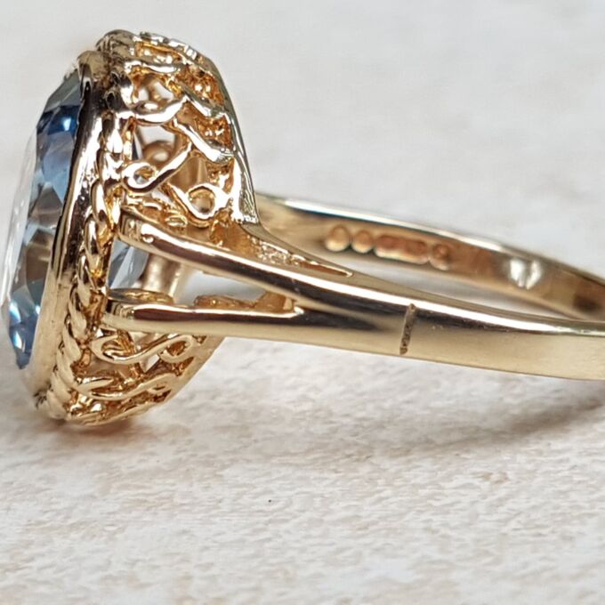 Pretty Synthetic Blue Spinel Solitaire Ring in 9ct Gold, a UK O or a US 7 1/4.