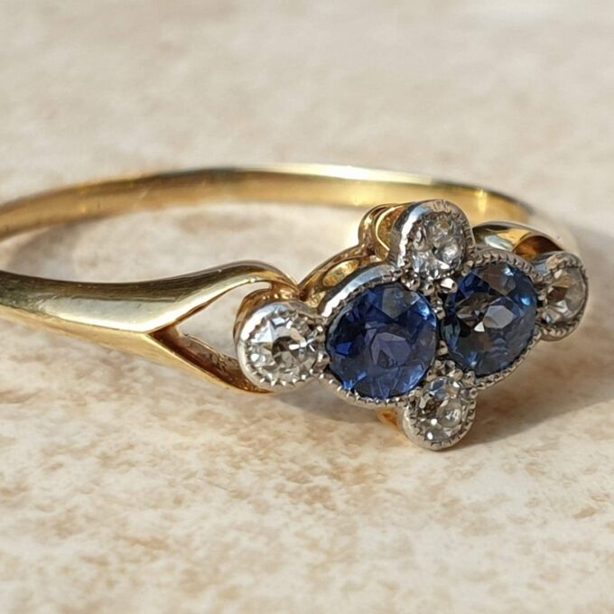 Twin Sapphire and Diamond Ring in 18ct Gold,  a UK P or a US 8.