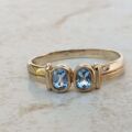 Torque Style Topaz Ring in 9ct Gold,  a UK M or a US 6 1/2.