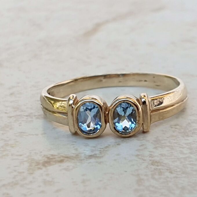 Torque Style Topaz Ring in 9ct Gold,  a UK M or a US 6 1/2.