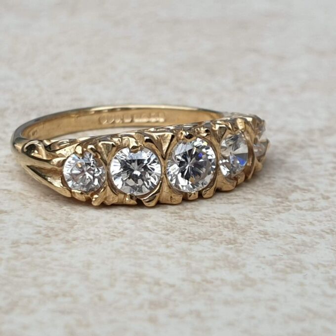 Graduating Paste Five Stone Ring in 9ct Gold,  a UK I 1/2 or a US 4 3/4.