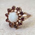 Opal and Garnet Halo Cluster Ring in 9ct Gold.