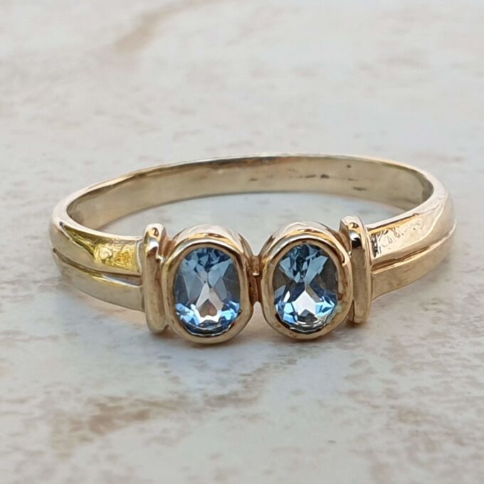 Torque Style Topaz Ring in 9ct Gold,  a UK M or a US 6 1/2.