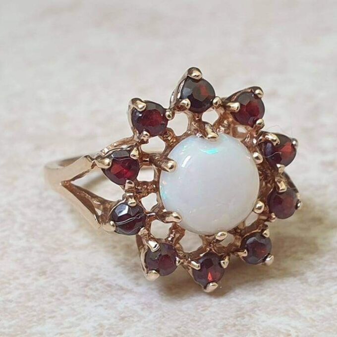 Opal and Garnet Halo Cluster Ring in 9ct Gold.
