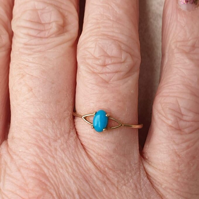 Turquoise Coloured Cabochon in 9ct Gold,  a UK O or a US 7 1/2.