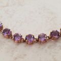 Amethyst Tennis Bracelet in 9ct Gold,  7 1/4 inches in length.