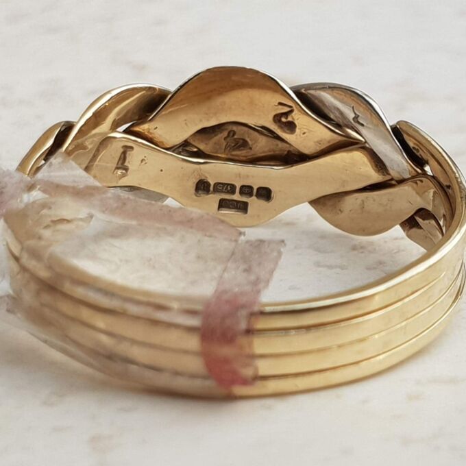 Four Piece Puzzle Ring with Diamond Accents in 9ct Gold, a UK P or a US 8.