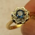 Sapphire and Diamond Daisy Ring in 18ct Gold,  a UK J or a US 5.