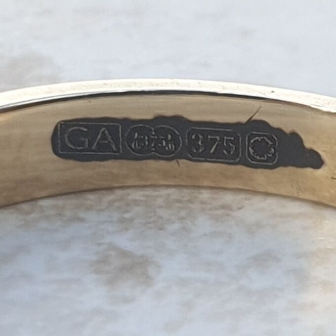 Diamond Set Wave Ring in 9ct Gold.