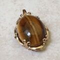 Striking Tigers Eye Pendant in 9ct Gold.
