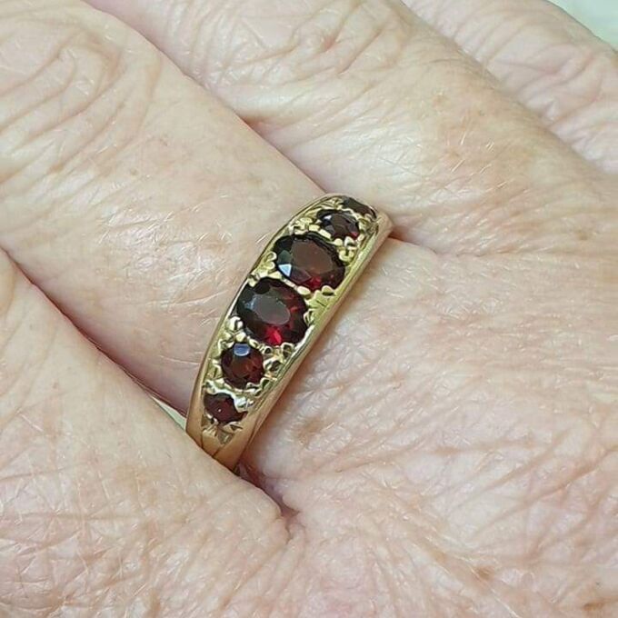 Six Stone Graduating Garnet Band Ring in 9ct Gold, a UK S or a US 9 1/4