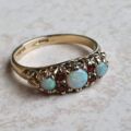 Opal and Garnet Ring in 9ct Gold, a UK N or a US 7