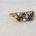 Intricate Multi Stone Opal and Sapphire Ring in 9ct Gold, a UK O or a US 7 1/4.