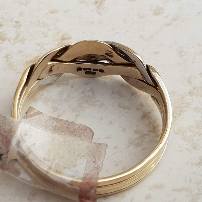 Four Piece Puzzle Ring with Diamond Accents in 9ct Gold, a UK P or a US 8.