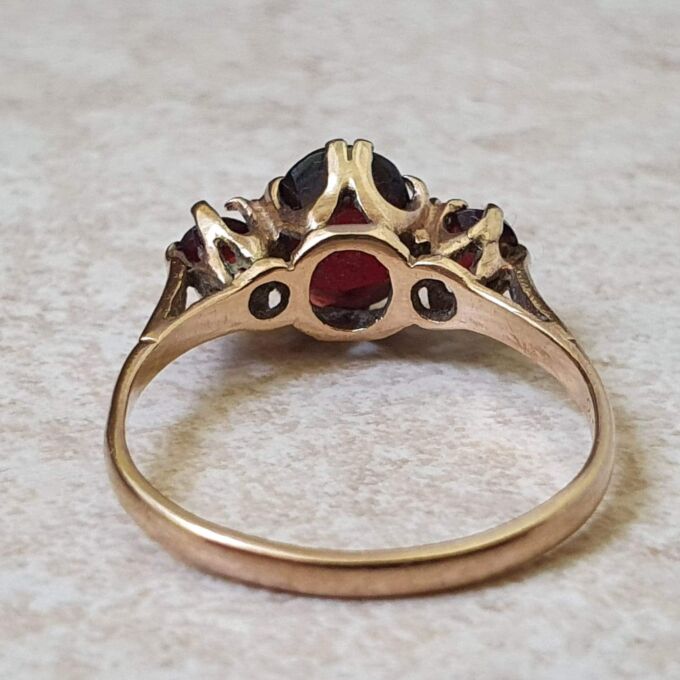 Garnet Trilogy Ring in 9ct Gold.