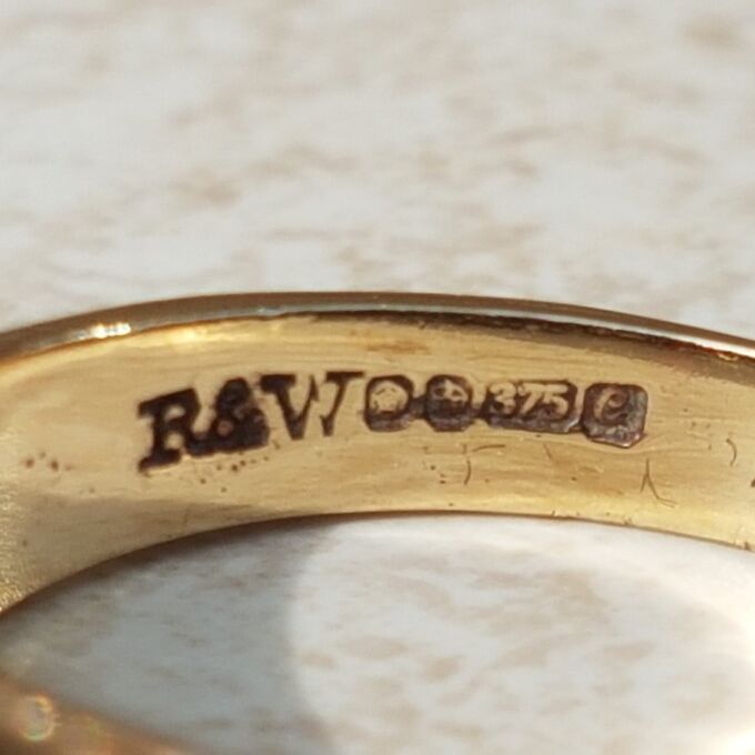 Five Stone Opal and Garnet 9ct Gold Ring, a UK K 1/2 or a US size 5 3/4.