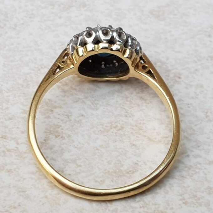 Sapphire and Diamond Halo ring in 18ct Gold and Platinum, a UK M or a US 6 1/2.