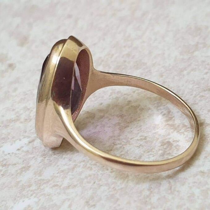 Elongated Oval Amethyst Solitaire Ring in 9ct gold.