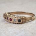 REGARDS Acrostic Ring in 9ct Gold, a UK O or a US 7 1/2