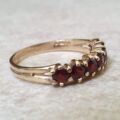 Seven Stone Garnet Band in 9ct Gold, a UK L 1/2 or a US 6