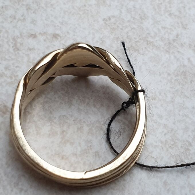 Four Piece Puzzle Ring in 9ct Gold, a UK N 1/2 or a US 7 1/2