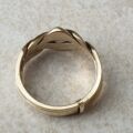Four piece Puzzle Ring in 9ct Gold,  a UK P 1/2 or a US 8.