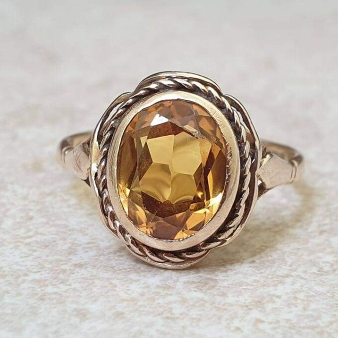 Vibrant Synthetic Yellow Sapphire in 9ct Gold, a UK N or a US 7