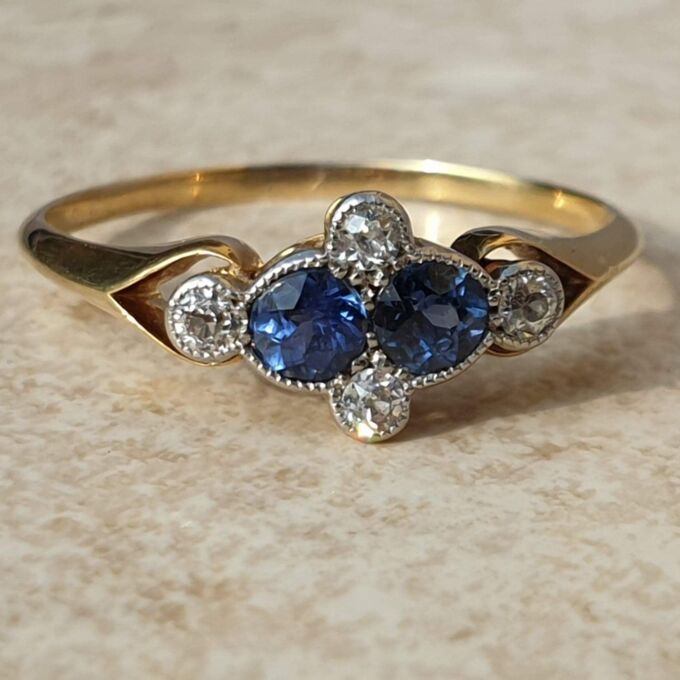 Twin Sapphire and Diamond Ring in 18ct Gold,  a UK P or a US 8.
