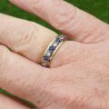 Synthetic Spinel Full Eternity Ring in 9ct Gold.