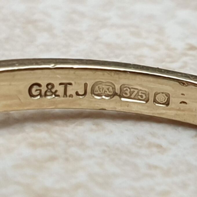 Topaz and Ring in 9ct Gold,  a UK O or a US 7 1/2